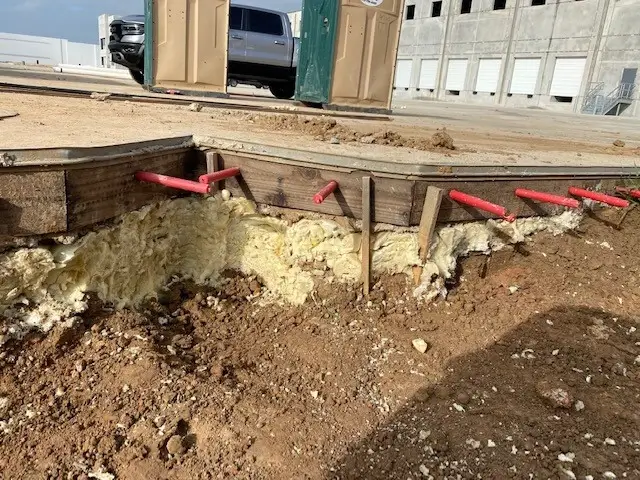 Foam repair from underground pipes at construction site.